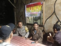 Bhabinkamtibmas Besitang Dialog Bersama Warga di Pos Kamling