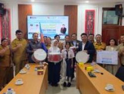 Bupati Taput Sambut Baik Bantuan Alat Marching Band dari PT Angkasa Pura Indonesia untuk SMP Negeri 2 Simangumban
