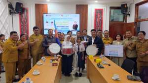 Bupati Taput Sambut Baik Bantuan Alat Marching Band dari PT Angkasa Pura Indonesia untuk SMP Negeri 2 Simangumban
